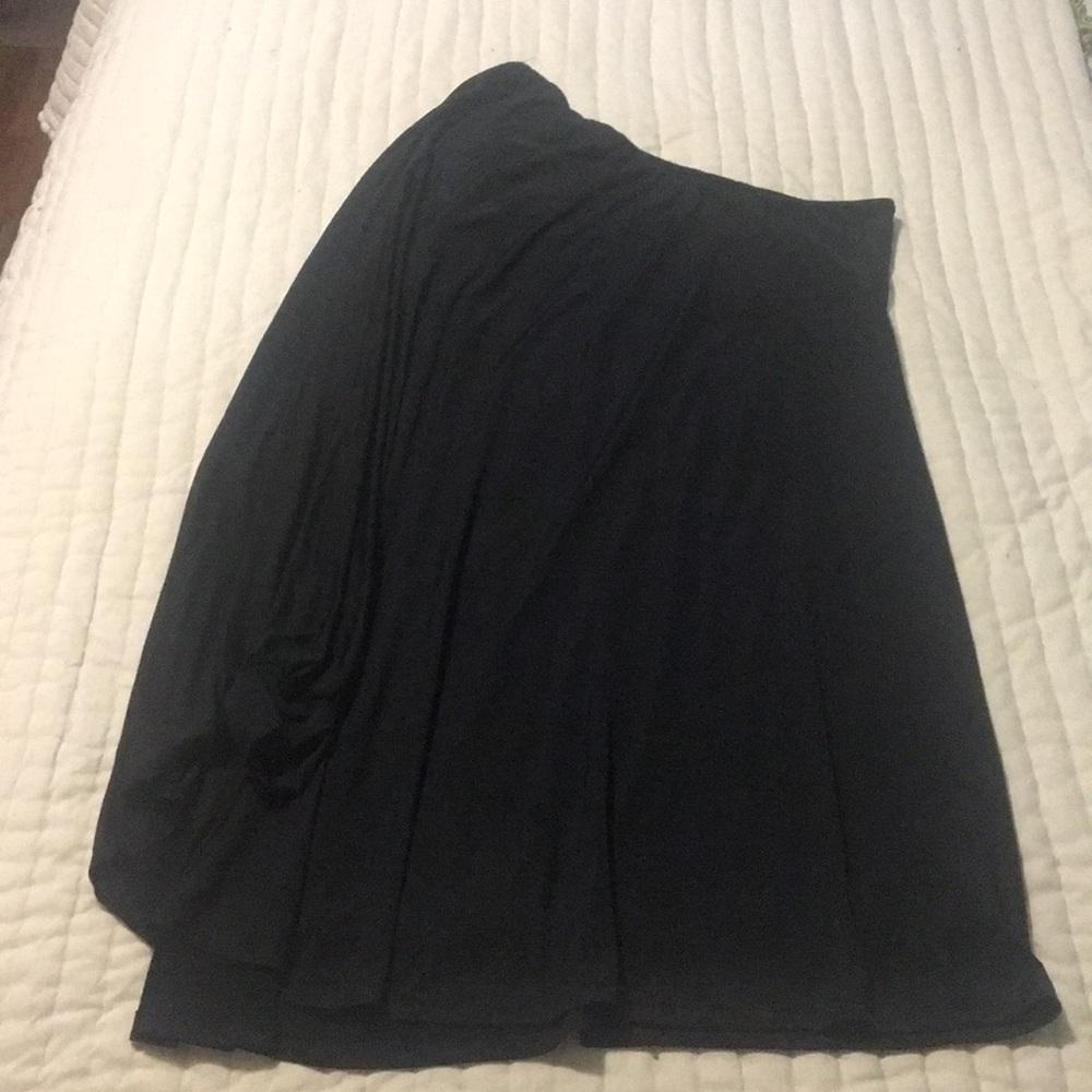 One shoulder/one sleeve sleek black mini dress